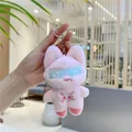 Close-up of pink plush fox keychain with blue goggles and silver metal clasp - Hanging Chain / Pink