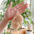 Cute brown capybara plush keychain with green bow and silver metal ring - Green Bowtie Style (Silver Bead Chain)
