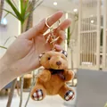 Portachiavi orsetto di peluche marrone con motivi a quadri su zampe ed orecchie piccole - Chiusura Oro / Marrone Scuro