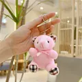 Rosa Teddybär-Schlüsselanhänger mit rosa Schleife und karierten Stoffdetails - Hängeketten-Stil / Rosa