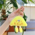Close-up of a cute plush cheese sandwich keychain with big eyes and long legs detail - Yellow (Small with Gold Clasp)