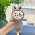 Close-up of grey plush Labubu keychain with soft fur texture and a cute wide smile - Style Without Chain / Khaki