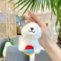 Close-up of a plush white seal pendant holding a colorful ball with golden chain - 12cm / Ball Chain Style / White