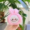 Close-up of pink plush rabbit charm with embroidered face details and soft fuzzy texture - Squeaky Hanging Style / Pink