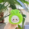 Close-up of a green plush Labubu pendant with embroidery and soft texture details - Squeaky Hanging Style / Green