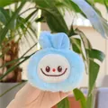 Close-up of soft blue plush Labubu pendant with cute embroidered cartoon expression - Squeaky Hanging Style / Blue