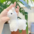 Detail of soft white alpaca plush keychain with silver metal ring and fluffy texture - Hanging Chain / Beige / Approx. 12cm
