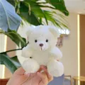 Close-up of white curly plush teddy bear pendant with woven strap for bags and keys - Hanging Chain / White / 11cm