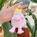 Close-up of cute plush chick keychain with long legs and pink piglet face detail - White Eggshell / 14cm Silver Link Chain