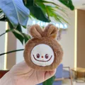 Cute brown plush monster keychain with bunny ears and white embroidered smiling face - Brown