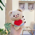 Detail of a plush bear keychain with a red heart and blue trimmed white apron - 11cm Standard Chain / Beige Red Heart