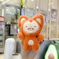 Close-up of soft orange plush fox keychain featuring a cute smiling face and fuzzy texture - Plain Chain / Squinting Laughing