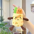 Close-up of cute plush pancake keychain with soft yellow texture and funny smiling face - Burrito with Scallion (Standard Chain)