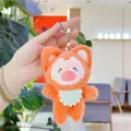 Close-up of orange plush fox keychain with crying expression and mint green bib - Plain Chain / Green Bib Style