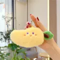 Close-up of cute plush mango keychain with soft faux mink fur and embroidered face details - Gold Metal Buckle / Mango (14cm)