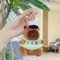 Close-up of plush capybara keychain in police outfit with striped shirt and metal ring - Traffic Police Metal Clasp / Approx. 13cm