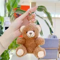 Close-up of a curly brown teddy bear plush keychain with golden metal clasp and fluffy texture - Gold Clasp / Brown / 11cm