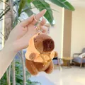 Close-up of a Capybara plush keychain wearing a yellow hoodie with an orange print - Yellow Hoodie-Metal Buckle / Approx. 11cm