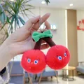 Detail of cute plush cherry keychain with big eyes and a green bow on a silver bead chain - Plain Chain / Cherry