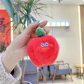 Detailed view of a soft red plush apple keychain with embroidered face and green leaf - Plain Chain / Red Apple