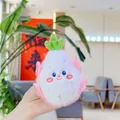 Cute plush pitaya keychain with pink scales and a smiling face held in hand - 10cm Mink Dragon Fruit / Gold Clasp