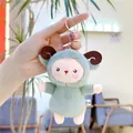 Detailed view of a green plush sheep keychain featuring curly horns and a metal ring - Chain Style / 12cm / Green