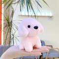 Close-up of small pink plush puppy keychain held in hand showing soft texture and mini size - Hanging Chain / Pink