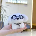 Close-up of white plush dog keychain with black glasses and a small silver bell - White Body White Ears