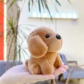 Close-up of a palm-sized cute brown plush puppy keychain with soft fluffy fur texture - Hanging Chain / Brown