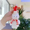 Close-up of white plush Christmas bear with red knitted hat and striped scarf - 11cm / Hanging Chain Style / Bleached White Red White Scarf