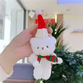 Close-up of white plush Christmas bear keychain with red hat and striped scarf - 11cm / Hanging Chain Style / Bleached White Red Green Scarf