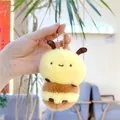 Detailed close-up of a soft plush bee keychain with fuzzy stripes and a silver chain - Approx 9cm / Bee with Ball Chain