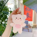 Close-up of pink plush pig keychain with gingham apron and delicate lace details - Pink Pig / Plain Chain