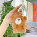 Macro view of brown plush bear keychain charm with soft fur and silver metal chain - Dark Brown