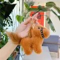 Detailed close-up of brown plush pony keychain with gold ring and lobster clasp - 13cm / Gold Metal Buckle / Long Haired Dark Brown