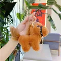Close-up of fluffy brown plush pony keychain with golden rivet bridle and metal ring - 13cm / Plain Chain / Long Haired Dark Brown