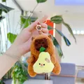 Close-up of plush capybara keychain holding a pear toy with golden metal clasp - Holding Pear - Gold Clasp