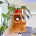 Dettaglio di un simpatico portachiavi capibara in peluche con mela rossa e bollicina - Mela Rossa - Stile Bolla (Catena)
