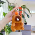 Close-up of plush capybara keychain with orange fruit accessory and funny bubble nose - Orange Tangerine - Bubble Style (Golden Hook)