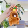 Cute Capybara plush keychain with small fruit decor and bubble detail on soft brown fur - Yellow Pineapple - Bubble Style (Golden Hook)