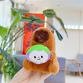 Detailed view of plush capybara keychain holding a purple mangosteen fruit toy - Holding Eggplant - Chain
