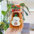 Close-up of cute plush capybara keychain holding an avocado with soft furry texture - Holding Avocado - Chain