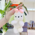 Détail d'un porte-clés chien en peluche avec nœud rose et fourrure douce blanche - Vert Avec Chaîne
