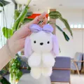 Détail d'un porte-clés chiot en peluche blanche avec de longues oreilles mauves - Violet Avec Chaîne