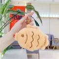 Detail of plush fish keychain with soft brown fur, embroidery, and gold metal clasp - Taiyaki (Golden Buckle)