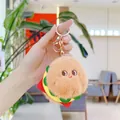 Vue détaillée d'un porte-clés burger en peluche avec visage brodé et fermoir doré - Hamburger / 8cm-15cm / Fermoir Doré