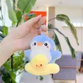 Detalle de llavero de pingüino de peluche con patito amarillo y cadena de bolas - Azul (Cadena de Bolas) / Aproximadamente 10 cm