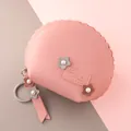 Pink faux leather half-round coin purse with shell edges and floral pearl decor - Pink