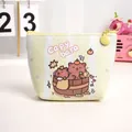 Cute Capybara coin purse with yellow stripes and waterproof textured leather finish - Bathing Capybara (A287)