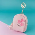Pink PU leather mini backpack coin purse with golden keychain and tassel detail - Clover Pink